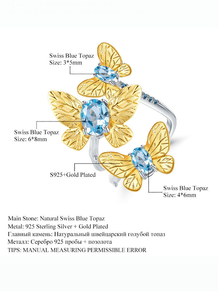 Anillo de banda artesanal de mariposa con topacio azul suizo de plata de ley 925