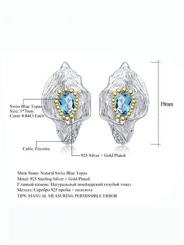 Boucles d'oreilles artisanales irrégulières en topaze bleue suisse en argent sterling 925