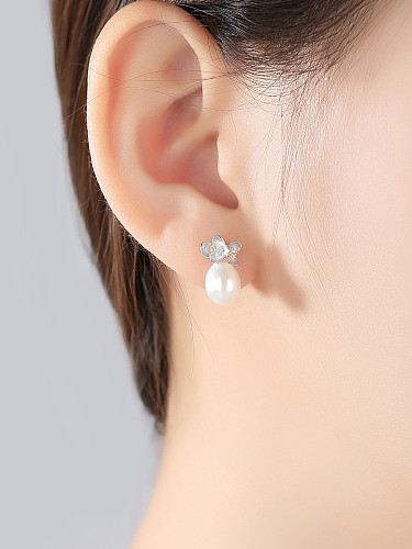 Boucle d'oreille fleur simple perle naturelle 8-9mm en argent sterling