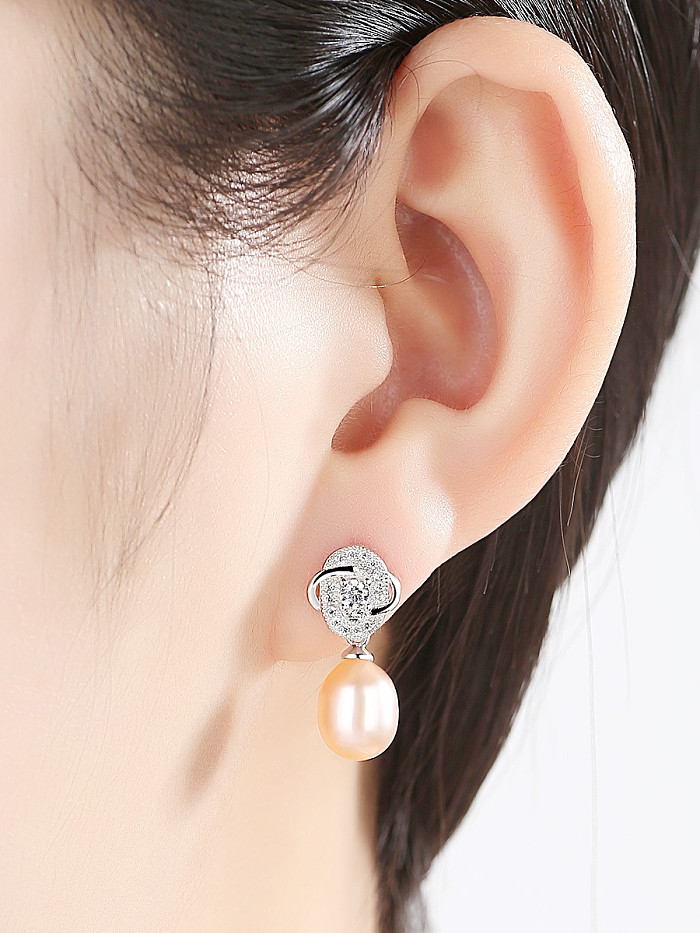 Boucles d'oreilles en argent sterling 925 avec fleur de personnalité plaquée platine
