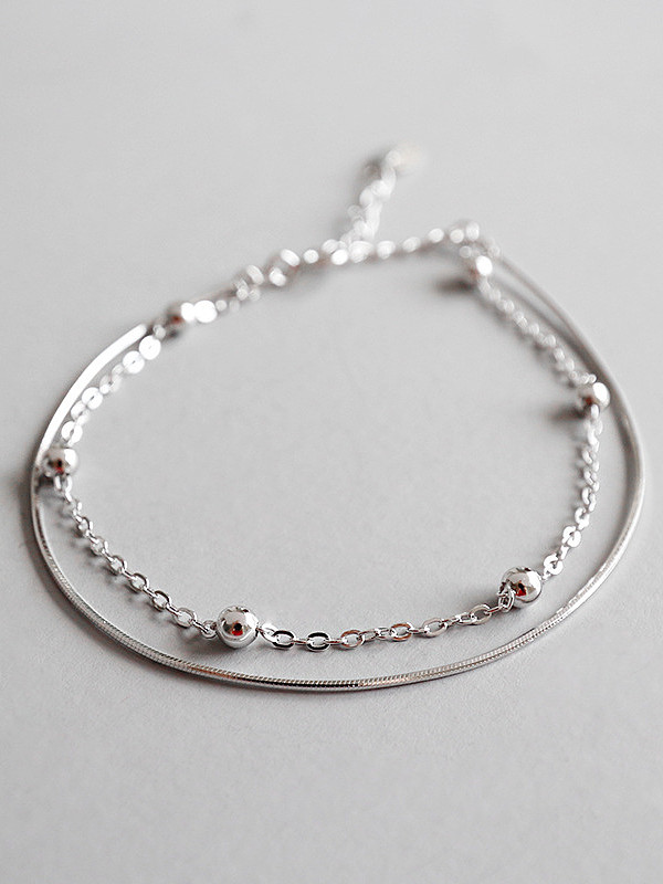Bracelet double chaîne en os de serpent avec perles minimalistes en argent sterling
