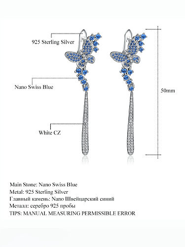 Boucles d'oreilles en argent sterling 925 avec topaze bleu suisse et pompon papillon