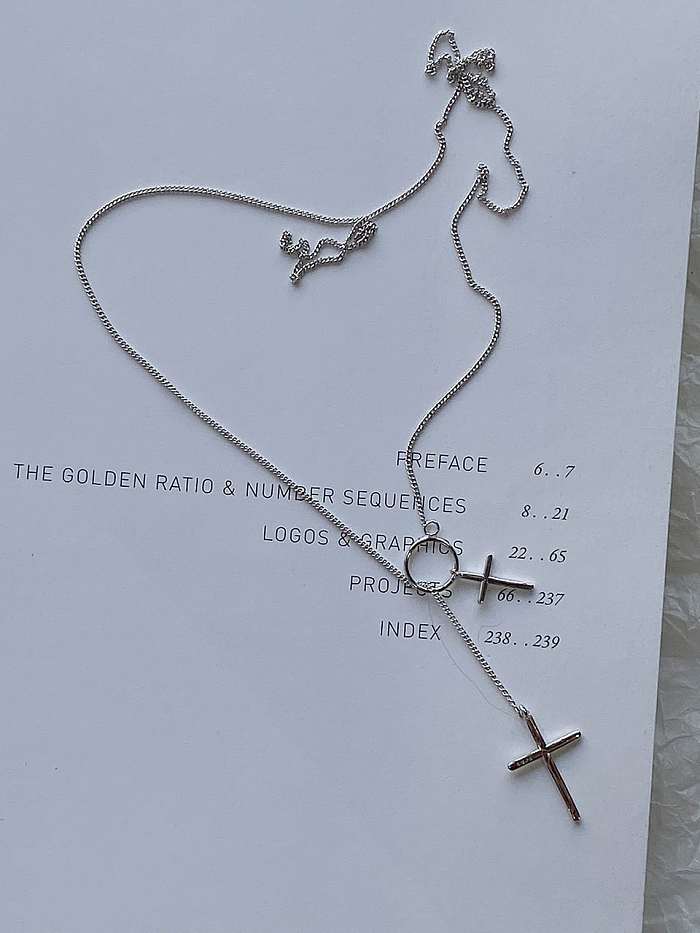 Collar de lazo minimalista con cruz de plata de ley 925