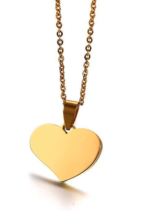Elegante colgante de titanio en forma de corazón chapado en oro