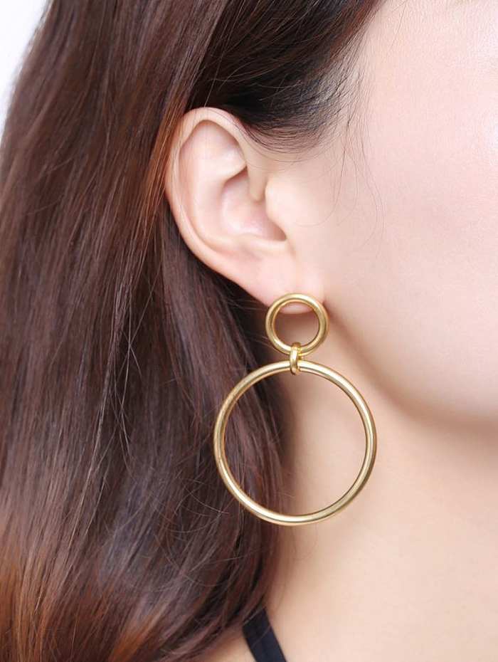Boucles d'oreilles pendantes en titane de forme ronde plaqué or Temperament