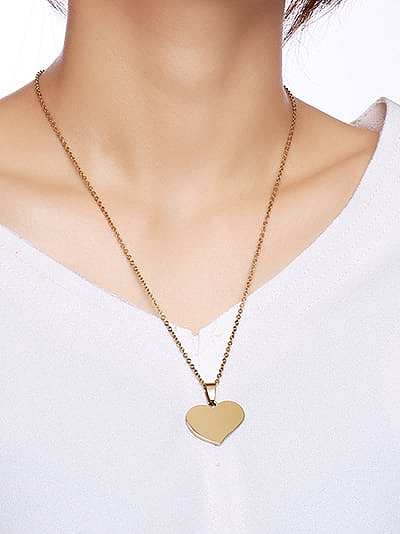 Élégant pendentif en titane en forme de coeur plaqué or