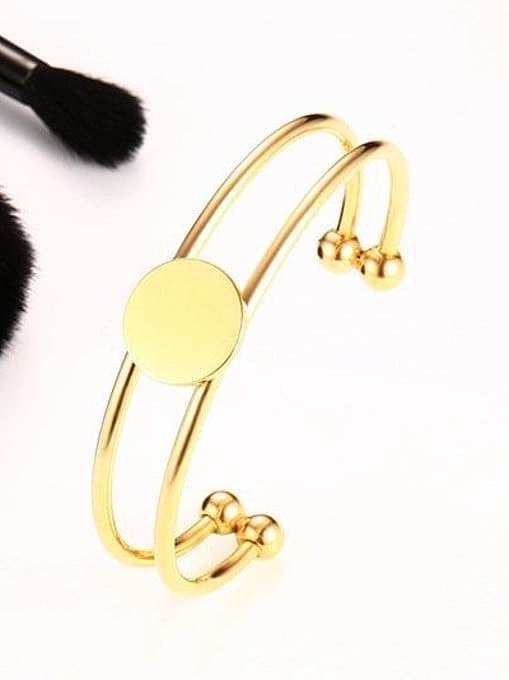 Bracelet en titane de forme ronde plaqué or à la mode