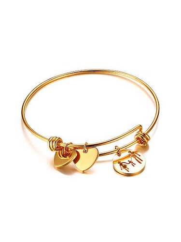 Bracelet en titane plaqué or en forme de cœur exquis