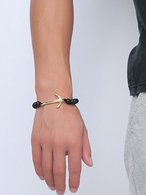 Pulsera de piedra negra chapada en oro de longitud ajustable