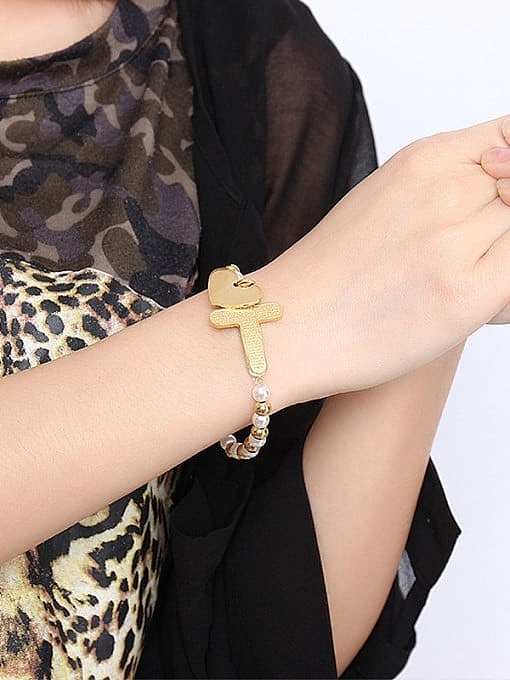 Fashionable Gold Plated Heart Shaped Pearl Charm Bracelet