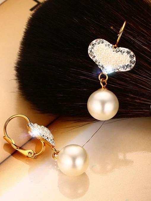 Boucles d'oreilles pendantes en perles artificielles en forme de coeur