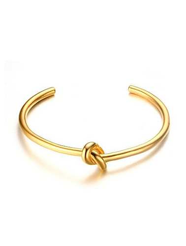Bracelet ouvert en titane en forme de nœud plaqué or