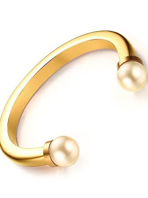 Bracelet en acier inoxydable avec perles synthétiques dorées