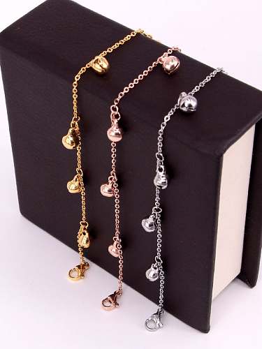 Tobillera minimalista con campana de titanio