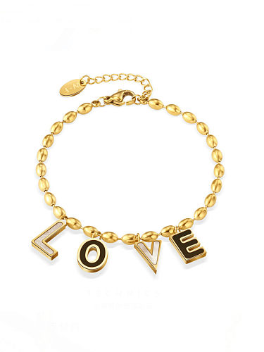 Bracelet perlé minimaliste en acier inoxydable avec lettre en coquillage