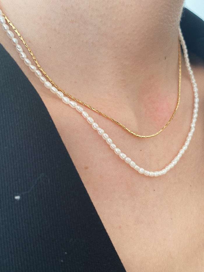 Collier minimaliste géométrique en perle d'imitation en acier au titane