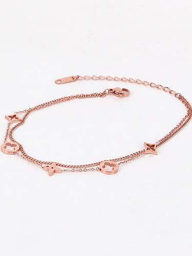 Tobillera delicada con flor de titanio