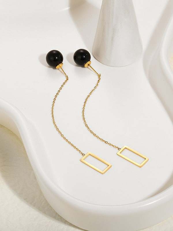 Boucle d'oreille enfileur minimaliste à gland géométrique en acier au titane avec perle d'imitation