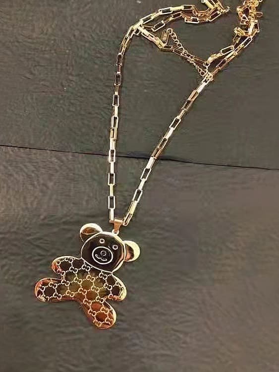 Collier de chaîne de chandail d'ours minimaliste en acier au titane