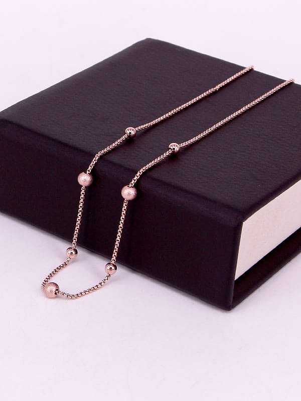 Collier minimaliste rond en perles d'acier au titane