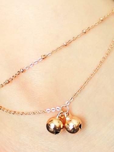 Tobillera minimalista con campana de titanio