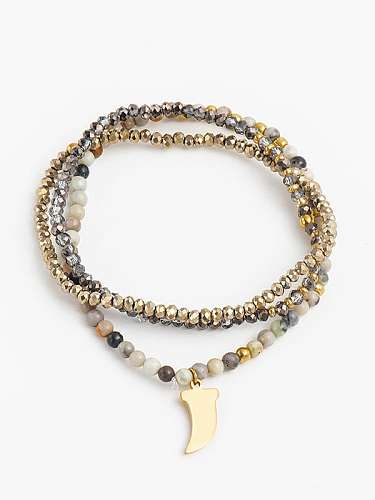 Bracelet extensible perlé pendentif croc de loup rétro en acier inoxydable