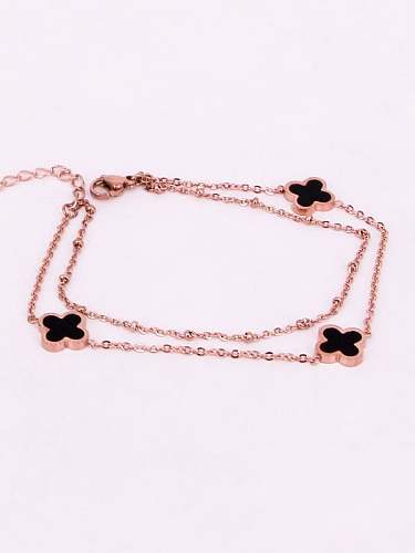 Tobillera delicada con trébol de titanio