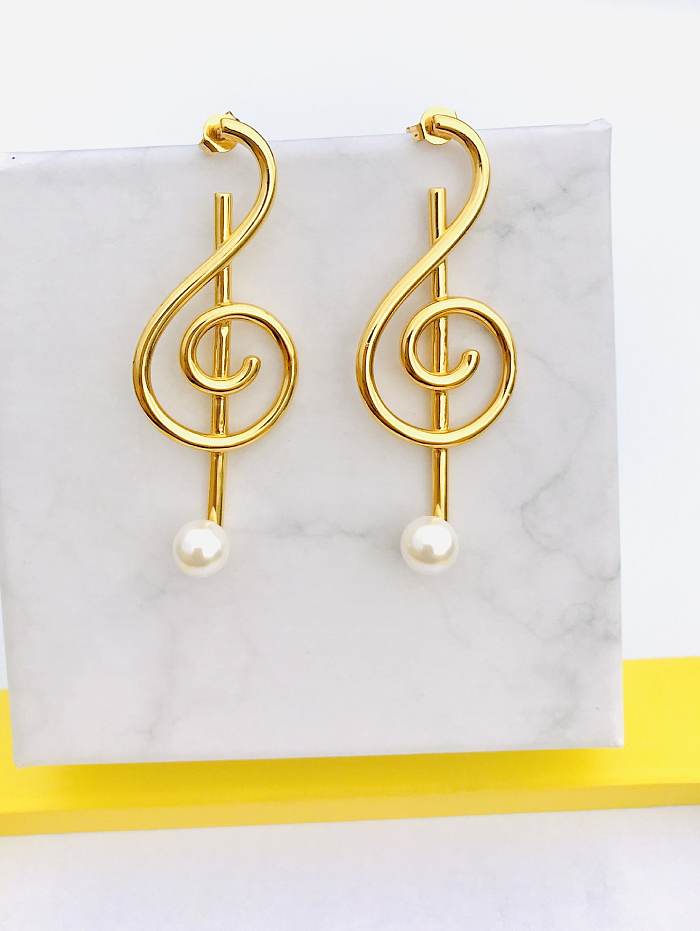 Boucles d'oreilles pendantes avec note minimaliste irrégulière blanche en titane imitation perle