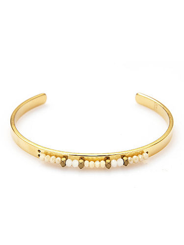 Bracelet manchette artisanal géométrique en perles d'acier au titane