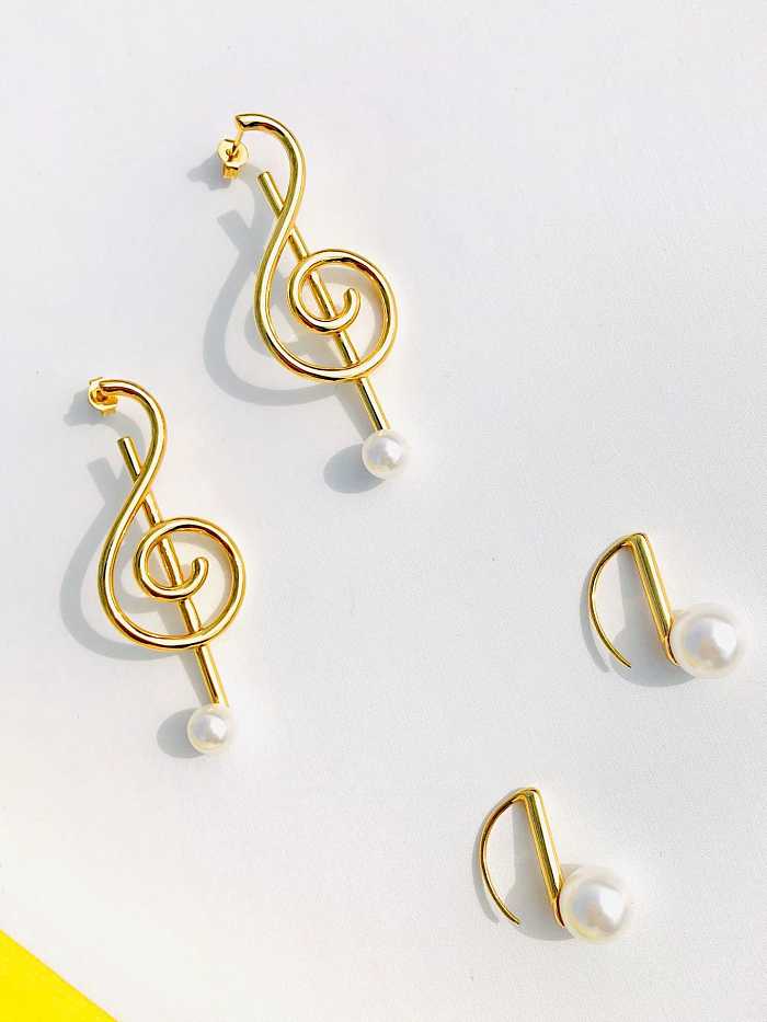 Boucles d'oreilles pendantes avec note minimaliste irrégulière blanche en titane imitation perle