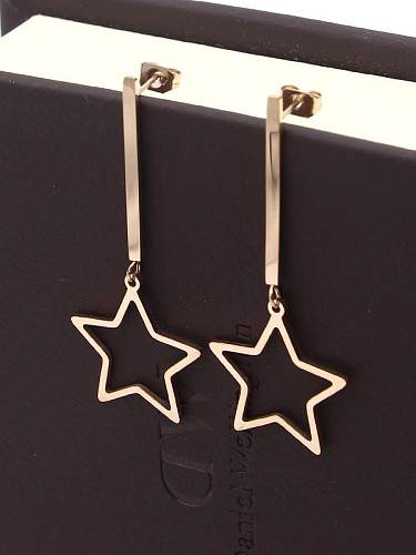 Boucle d'oreille pendante minimaliste étoile en titane