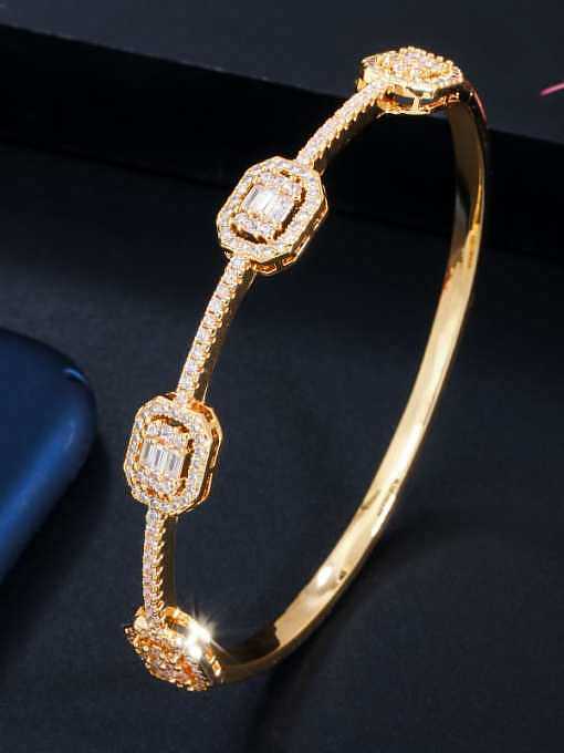 Juego de anillo y brazalete geométricos de lujo con circonitas cúbicas de cobre