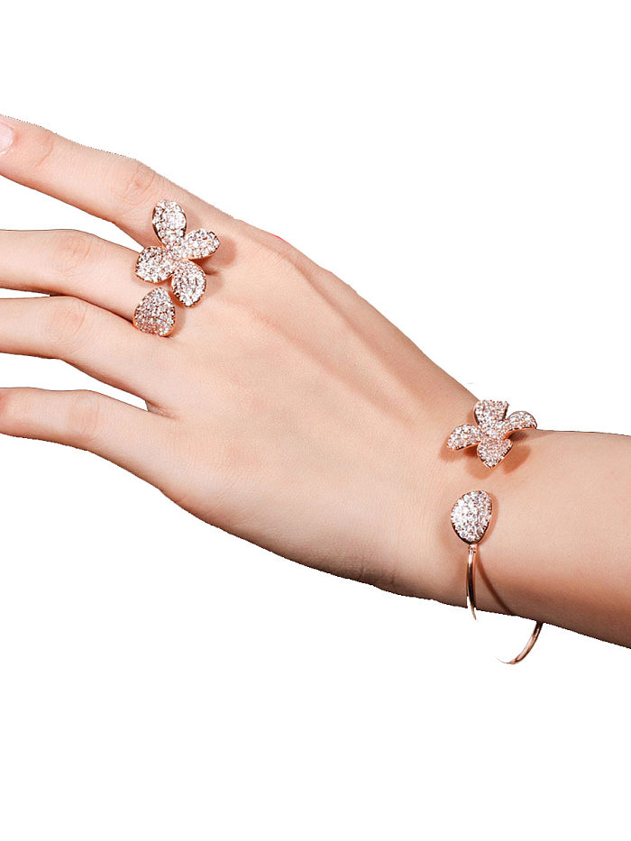 Cuivre avec zircone cubique fleur de luxe 2 pièces ensemble de bijoux bagues et bracelets