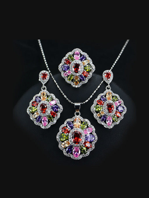 Conjunto de joyería de tres piezas de flor de circonitas de colores
