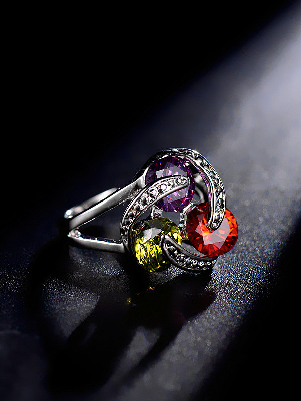 Exquisito anillo llamativo con circonitas de colores