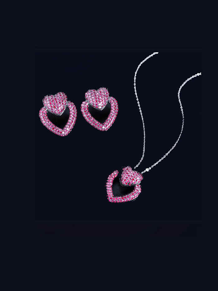 Ensemble de boucles d'oreilles et de collier en forme de cœur avec zircon cubique en laiton