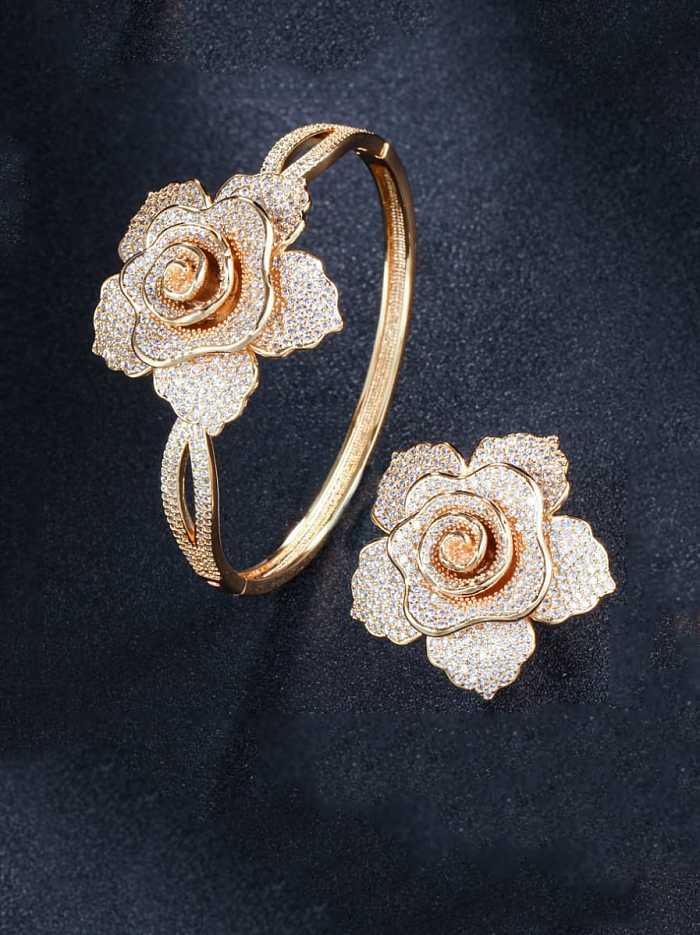 Juego de anillo y brazalete de lujo con flor de circonita cúbica de latón