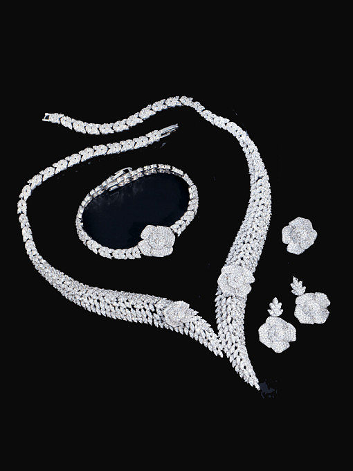 Laiton cubique zircone luxe fleur bague boucle d'oreille bracelet et collier ensemble
