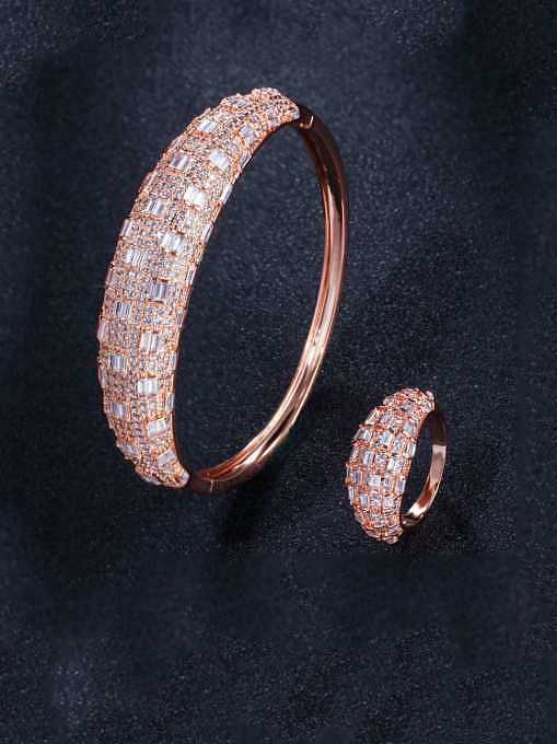 Conjunto de anillo y brazalete geométricos de lujo con circonitas cúbicas de latón