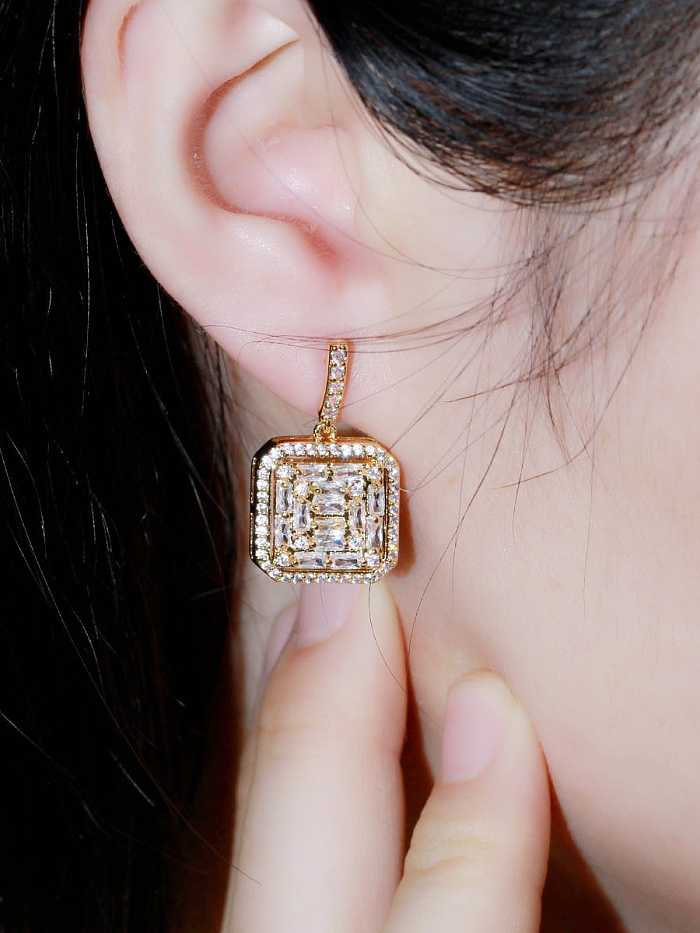 Boucles d'oreilles pendantes de luxe géométriques en laiton et zircon cubique