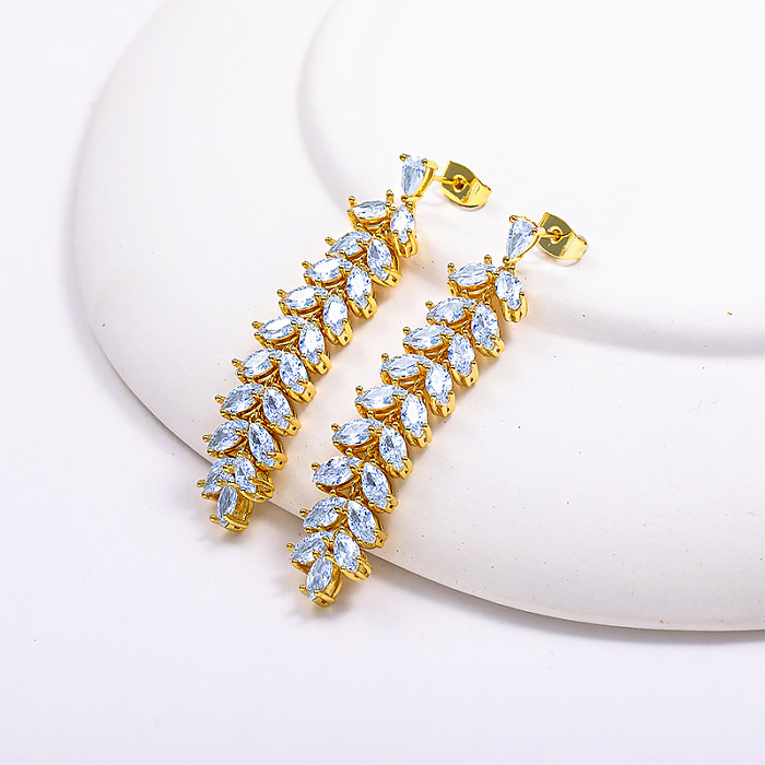 Boucles d'oreilles à pampilles en or 18 carats et zircon cubique