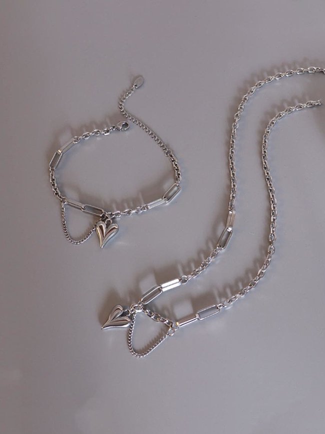 Ensemble de bracelets et colliers en forme de cœur artisanal en acier inoxydable 316L en titane avec revêtement en e imperméable à l'eau