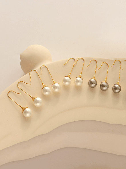Boucles d'oreilles à crochet vintage irrégulières en perle d'imitation en acier au titane