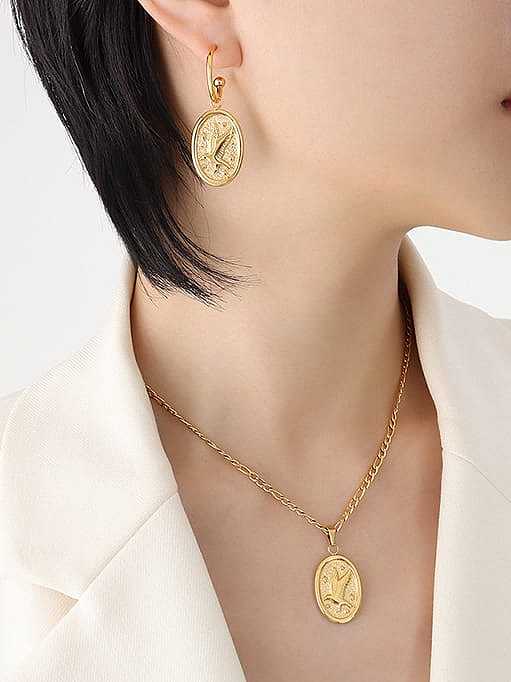Set aus geometrischem Vintage-Ohrring und Halskette aus Titanstahl