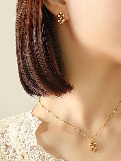 Boucles d'oreilles et collier en acier au titane avec perles géométriques vintage