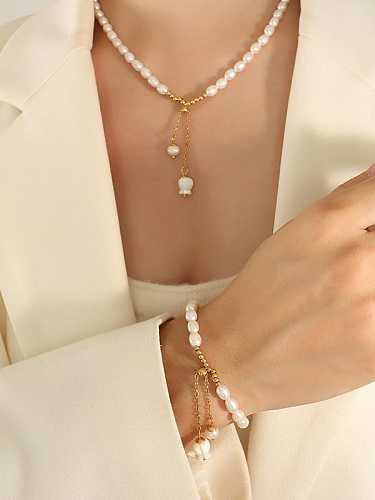 Ensemble bracelet et collier fleur minimaliste perle d'eau douce en acier titane