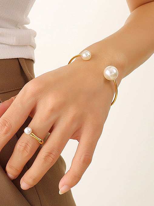 Bracelet manchette géométrique minimaliste en acier au titane avec perle d'imitation