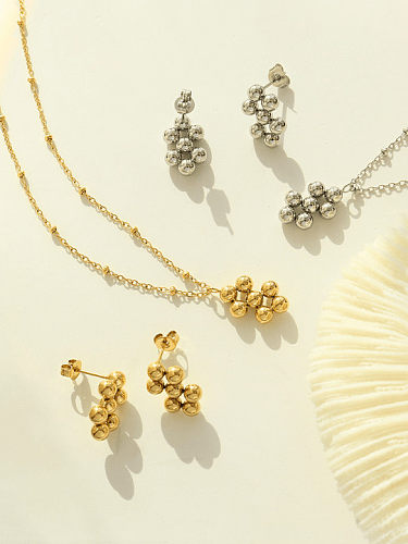 Boucles d'oreilles et collier en acier au titane avec perles géométriques vintage