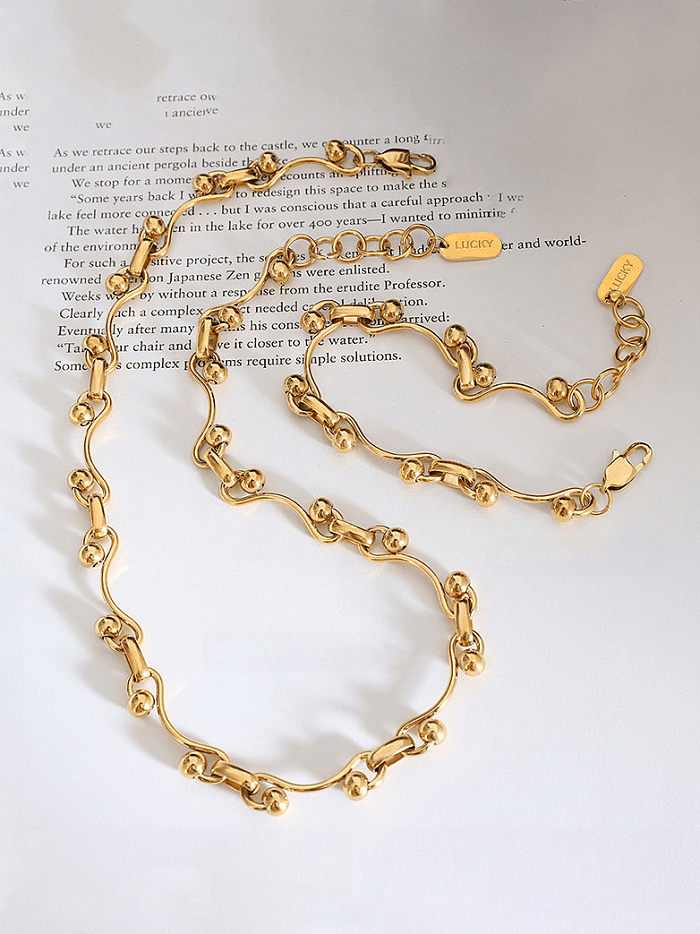 Conjunto de colar e pulseira vintage de contas irregulares de aço titânio
