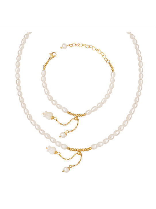 Ensemble bracelet et collier fleur minimaliste perle d'eau douce en acier titane